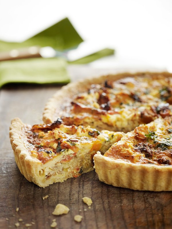 Quels sont les secrets pour réussir une quiche aux poireaux avec une pâte brisée maison?